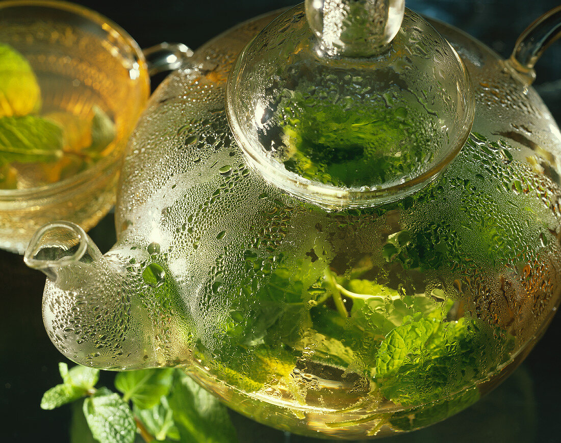Peppermint tea in glass teapot