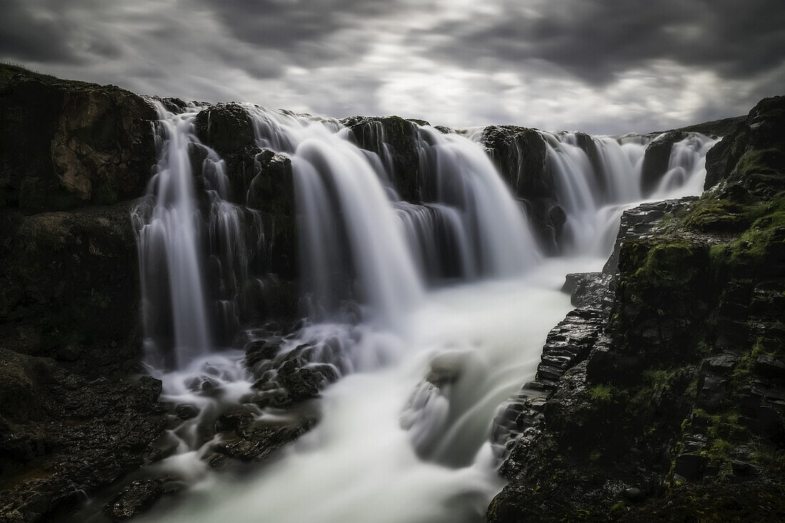 Moody image of waterfalls in the central area of Iceland in a long exposure; Iceland