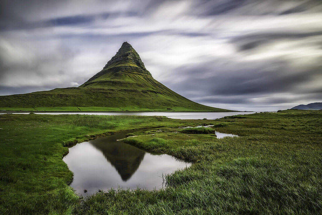 Kirkjufell, the most photographed mountain in Iceland, taken here with a long exposure, Snaefellsness Peninsula; Iceland