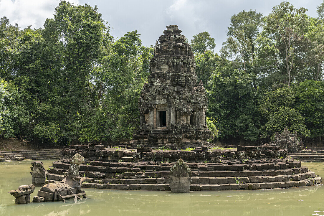 Circular stone monument in Neak Pean pond, Angkor Wat; Siem Reap, Siem Reap Province, Cambodia