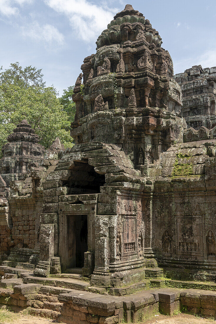 Doorway to stone temple with holed roof, Angkor Wat; Siem Reap, Siem Reap Province, Cambodia