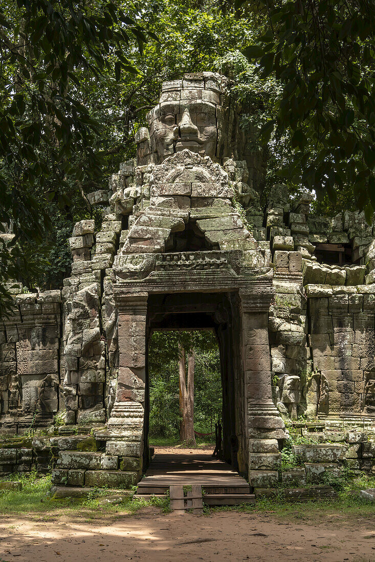 Stone entrance to Banteay Kdei with Buddha, Banteay Kdei, Angkor Wat; Siem Reap, Siem Reap Province, Cambodia