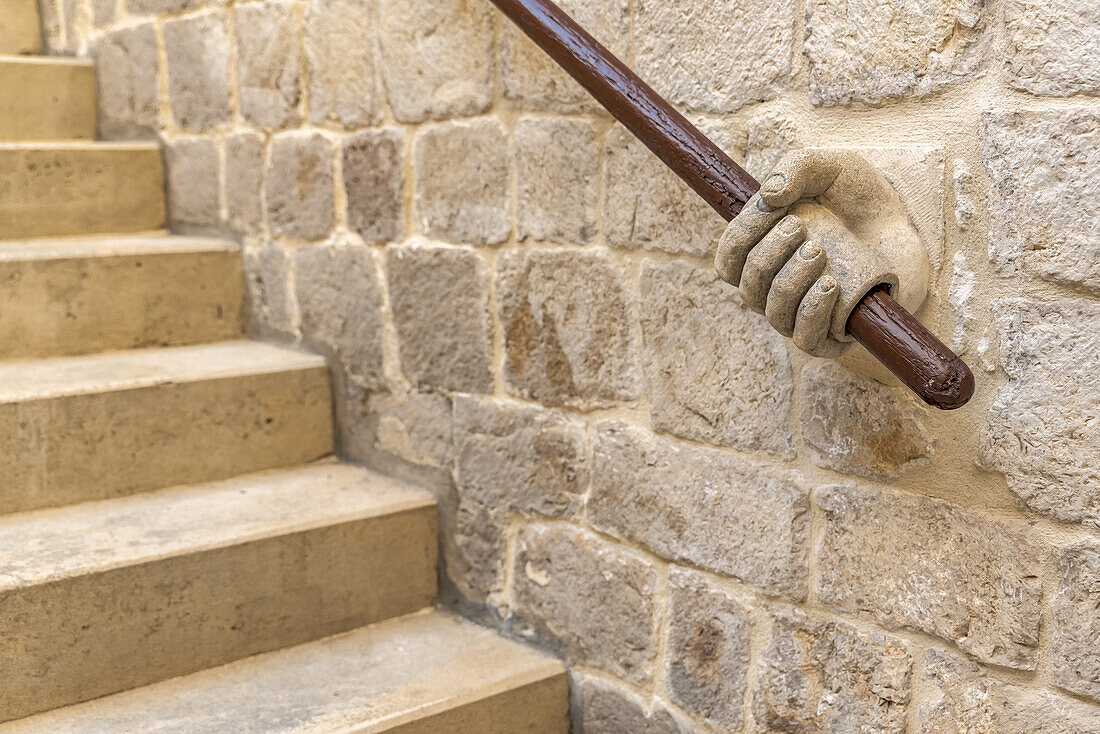 Decorative handrail of human hand holding rail, inside the Rector's Palace; Dubrovnik, Dubrovnik-Neretva County, Croatia