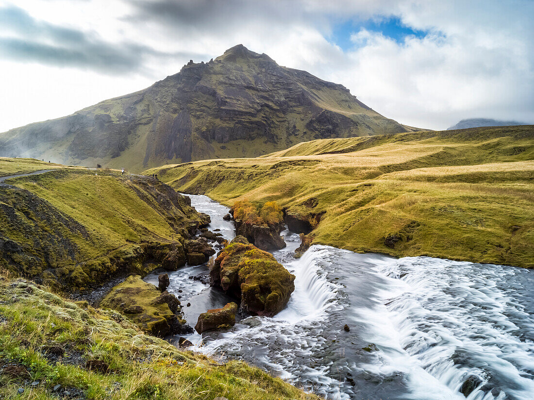 Skogafoss is one of Iceland’s biggest and most beautiful waterfalls with an astounding width of 25 meters and a drop of 60 meters; Rangarping eystra, Southern Region, Iceland