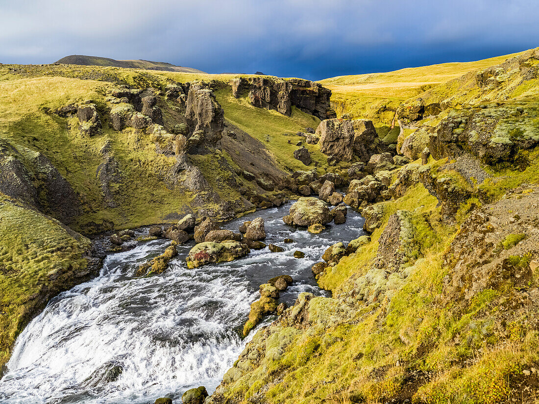 Skogafoss is one of Iceland’s biggest and most beautiful waterfalls with an astounding width of 25 meters and a drop of 60 meters; Rangarping eystra, Southern Region, Iceland