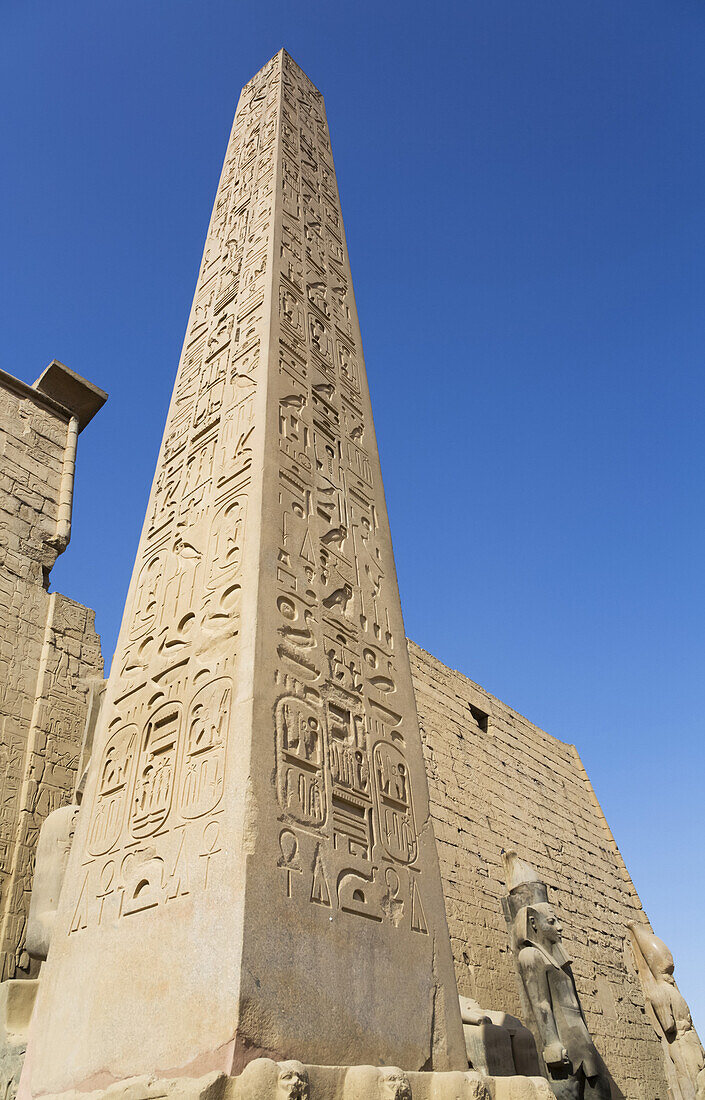 Obelisk, Colossi of Ramses II in Front of Pylon, Obelisk, Luxor Temple, UNESCO World Heritage Site; Luxor, Egypt