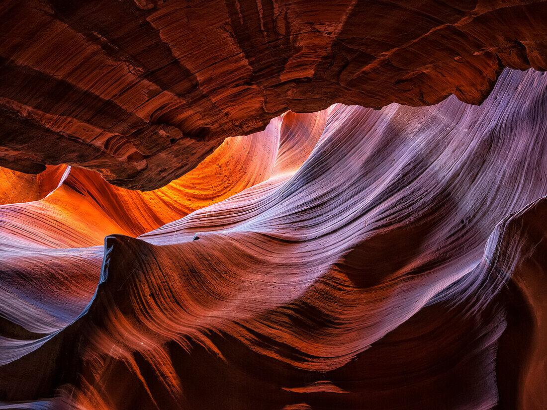 The beautiful sandstone canyons surrounding Page, Arizona. It is amazing being below the earth and seeing the surreal light filtering down into the canyon depths; Page, Arizona, United States of America