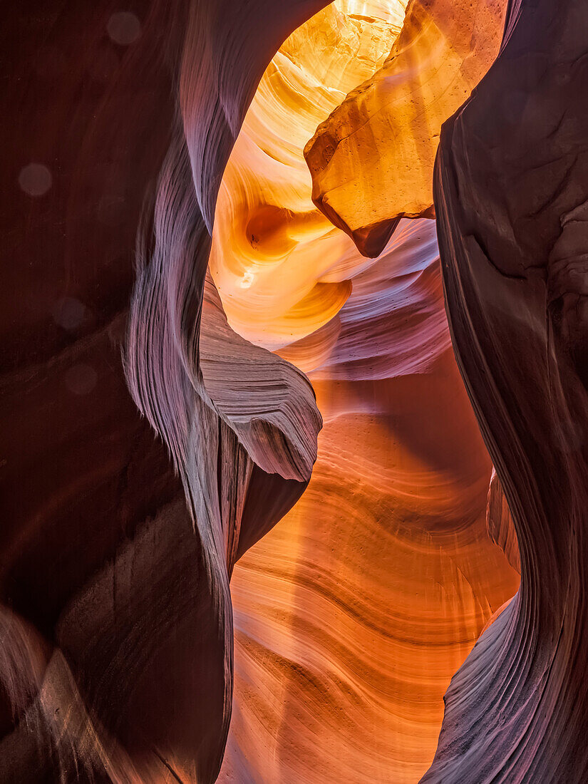 A slot canyon outside of Page, Arizona. Beautiful colours and sandstone caused by eons of wind and water erosion; Page, Arizona, United States of America