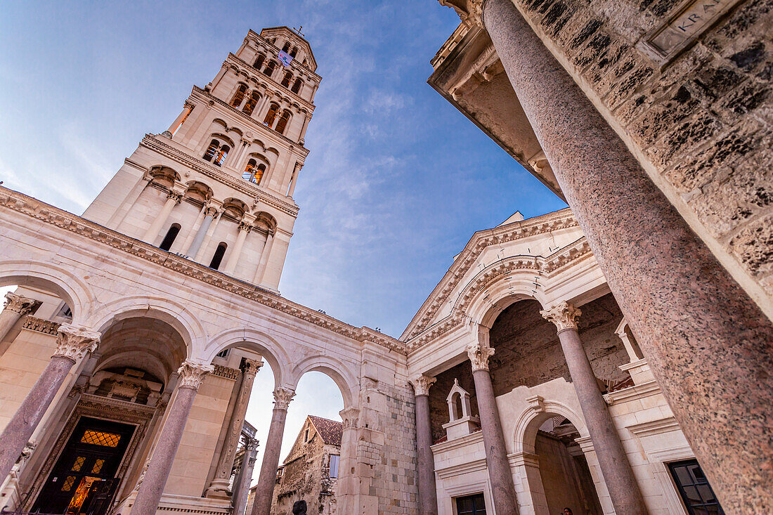 Roman Emperor Diocletian's Palace, located in the central Piazza Peristil, with the Cathedral of St Domnius (Diocletian's Mausoleum turned cathedral) and it's 13th Century bell tower; Split, Croatia