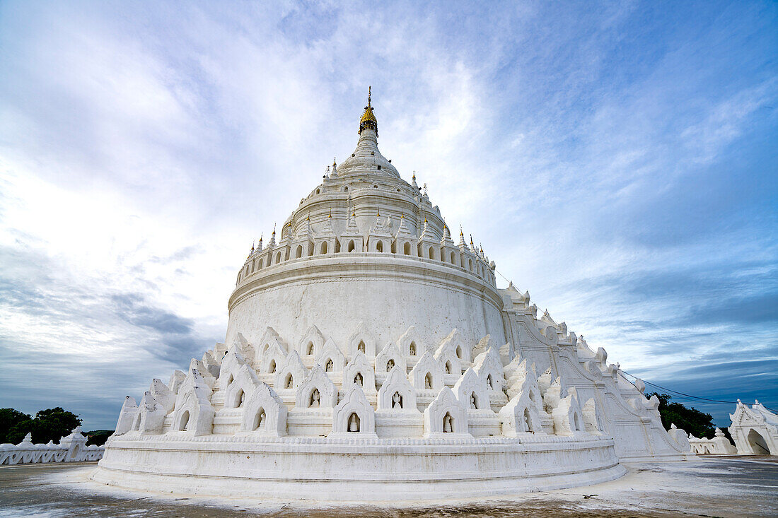 Hsinphyume Pagoda (Mya Thein Tan Pagoda) painted white with its design based on the Buddhist sacred mountain of Mount Meru, situated on the western bank of the Ayeyarwady (Irrawaddy) River; Mingun, Sagaing Region, Myanmar (Burma)