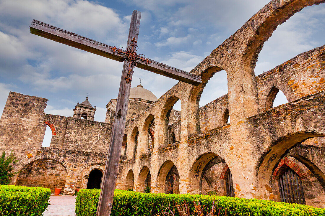 Old wooden cross and remains of the historical Franciscan, Mission Conception and Conception Park; San Antonio, Texas, United States of America