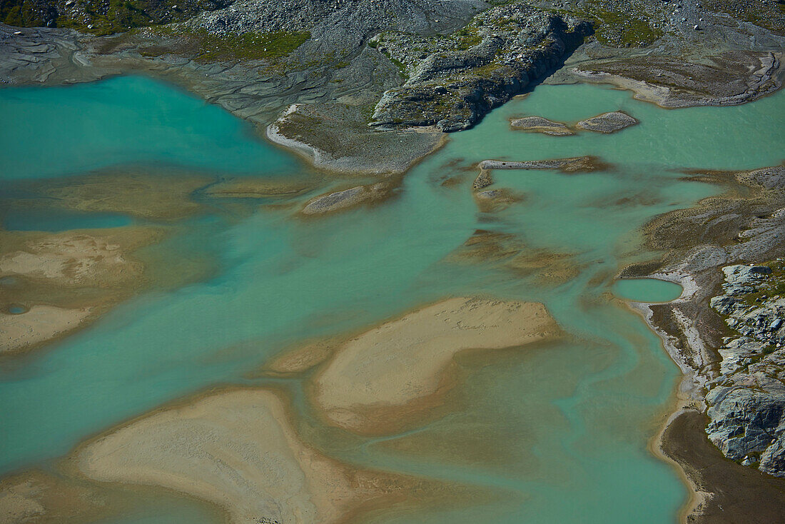 Lake of Glacier Pasterze from Gamsgrubenweg with its turquoise, muddy water, Franz-Joseph-Höhe on an early morning; Kärnten (Carinthia), Austria