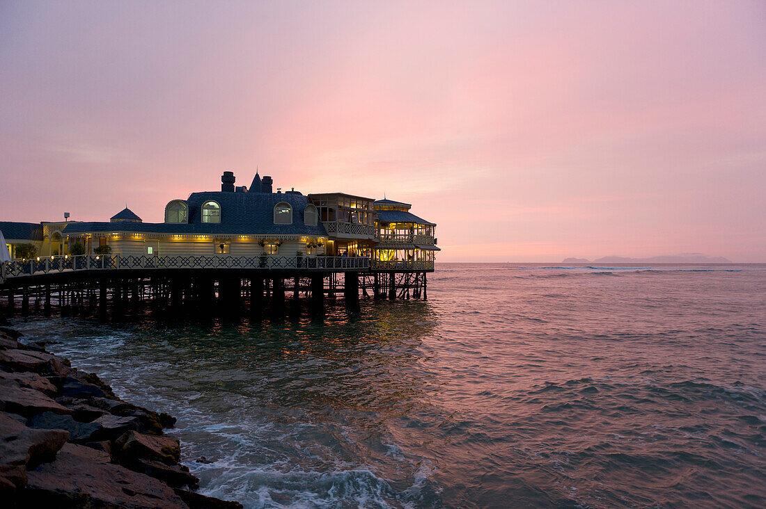 Restaurant On Pier In Evening Light; Miraflores District Lima Peru
