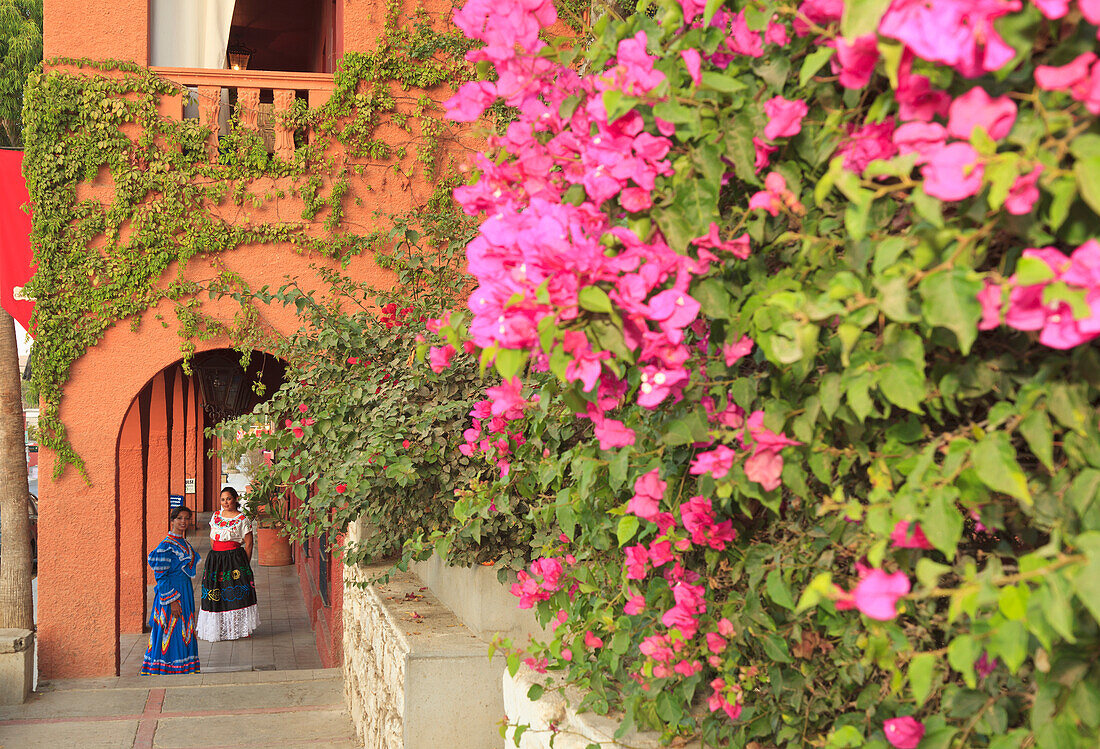 Women In Traditional Folkloric Dresses In Downtown In The Early Morning; Todos Santos Baja California Sur Mexico