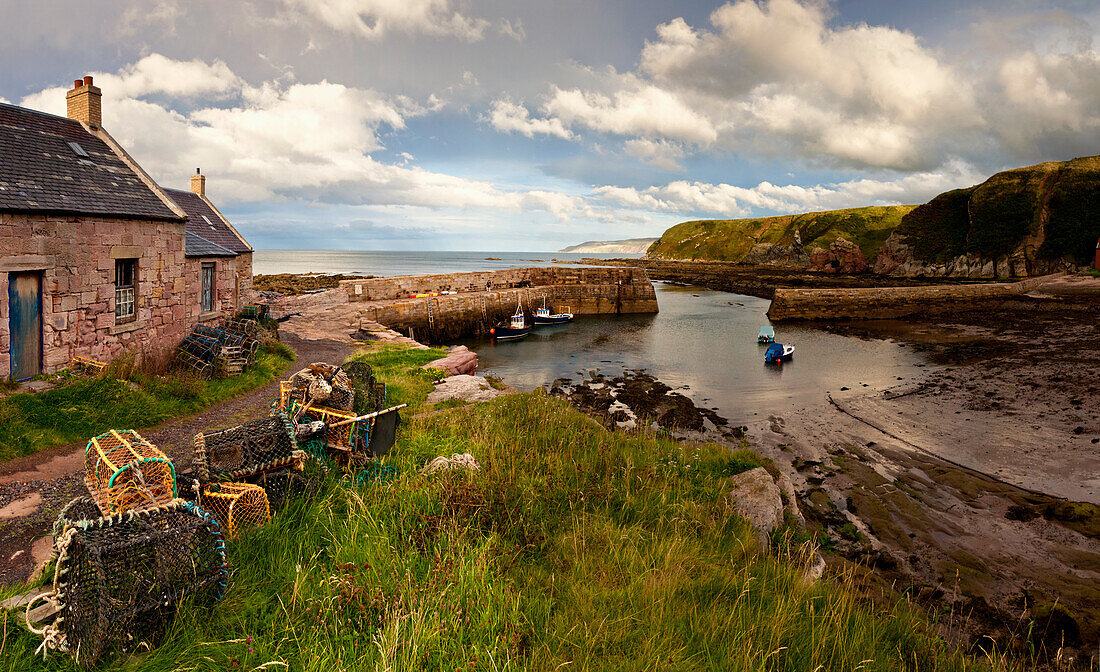 Fishing Traps A House And Boats Mooring On The Coast; Cove Lothian Scotland