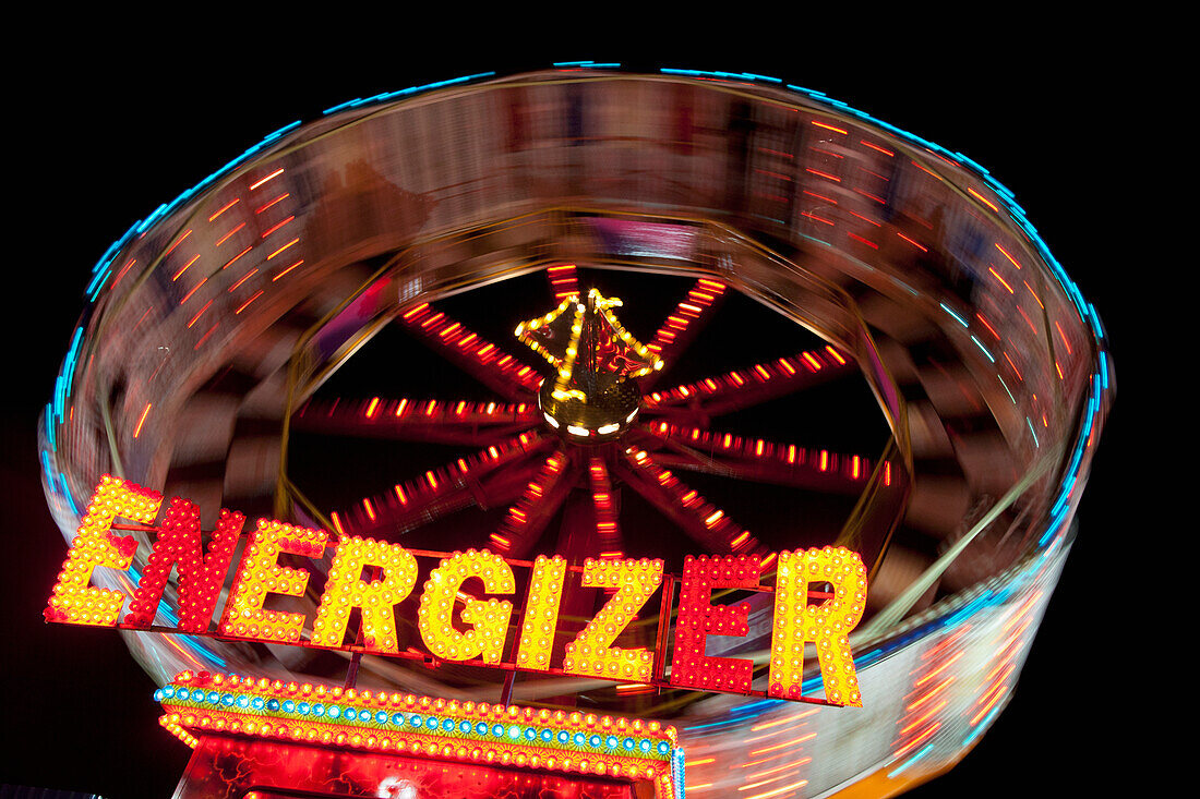 An Amusement Park Ride Called Energizer Illuminated At Night; South Shields Tyne And Wear England