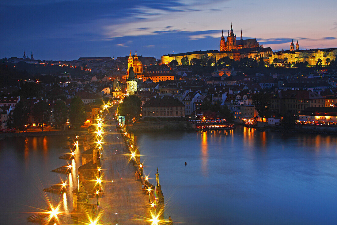 Night Lights Of Charles Bridge Or Karluv Most And Royal Palace On Castle Hill; Prague Czech Republic