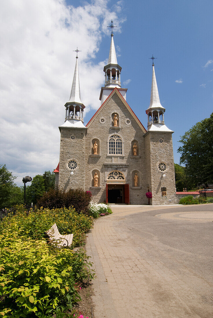 A Church With White Bell Towers; Ile D'orleans Quebec Canada