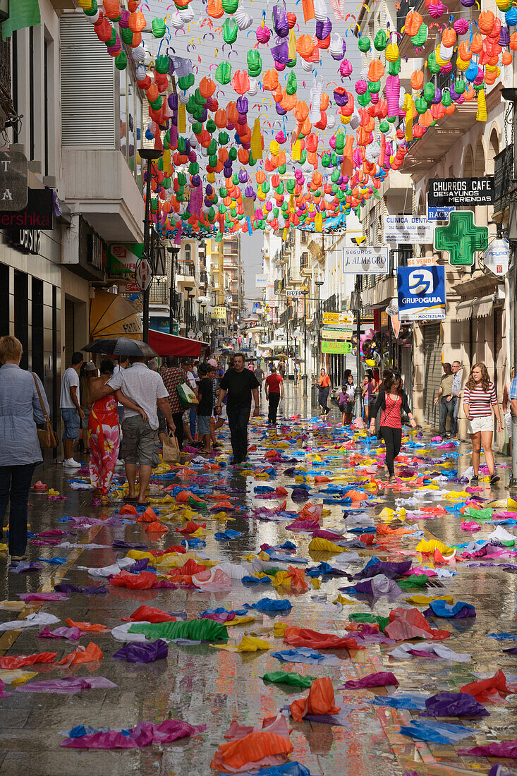 A Promenade Between The Shops Decorated By A Canopy Of Colourful Paper Balloons Fallen In The Rain; Ronda Malaga Spain