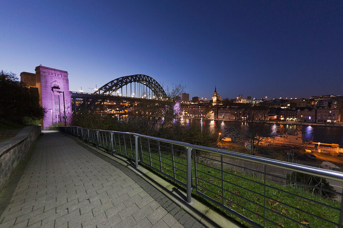 A Promenade Along River Tyne With Tyne Bridge In The Distance; Gateshead Tyne And Wear England