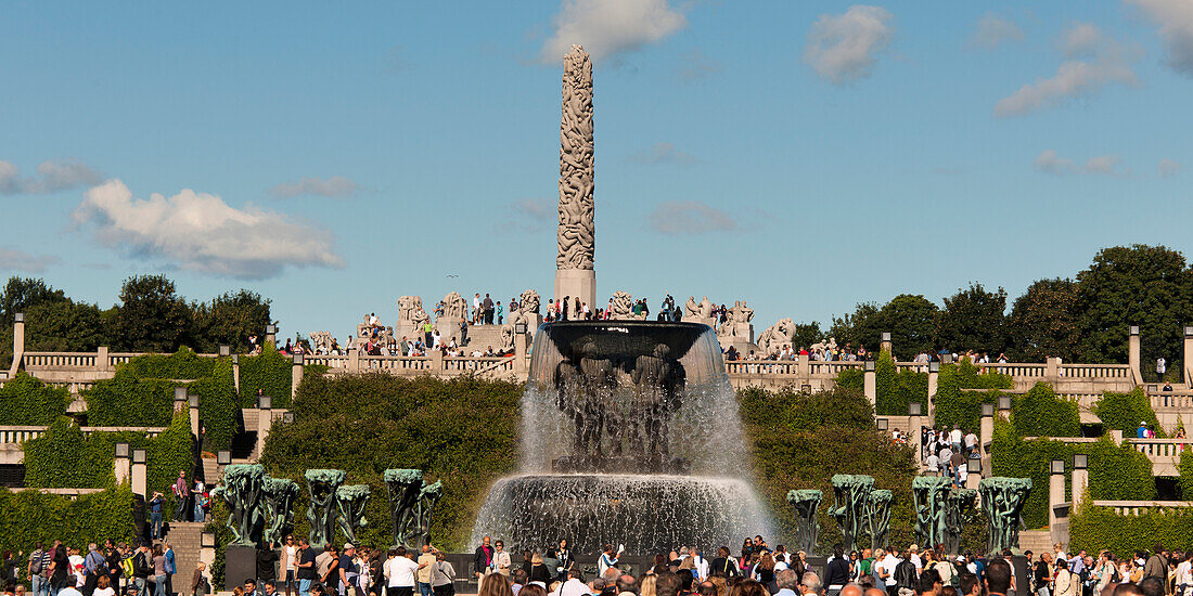 The Fountain Monolith And A Crowd Gathered In Frogner Park Vigeland Sculpture Park; Oslo Norway