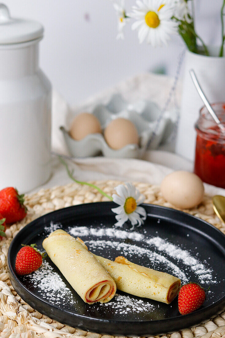 Pancake rolls with strawberry jam