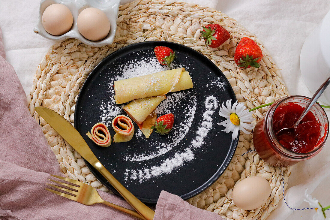 Pancake rolls with strawberry jam