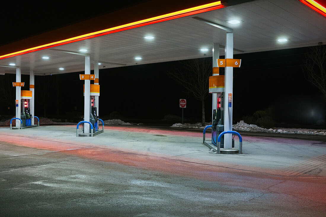 Gas Station Pumps at Night