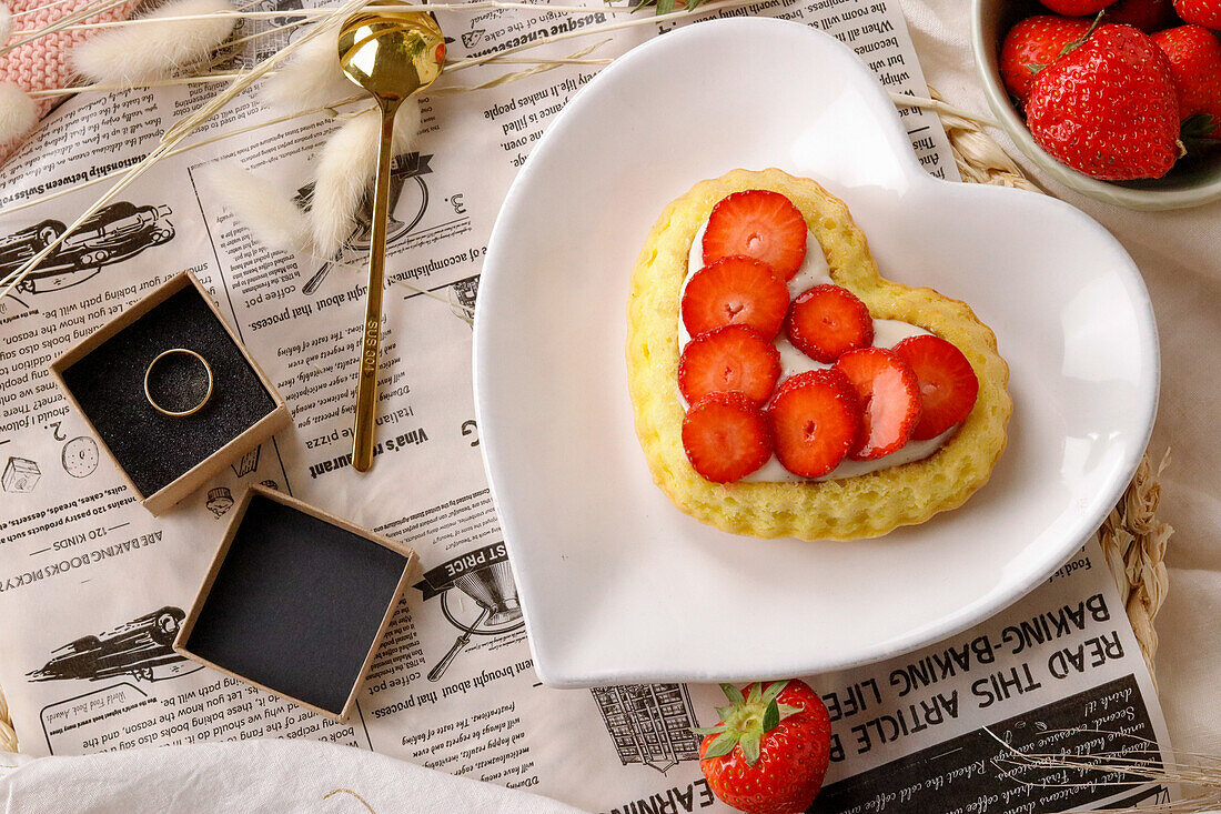 Heart-shaped strawberry tartlet for engagement