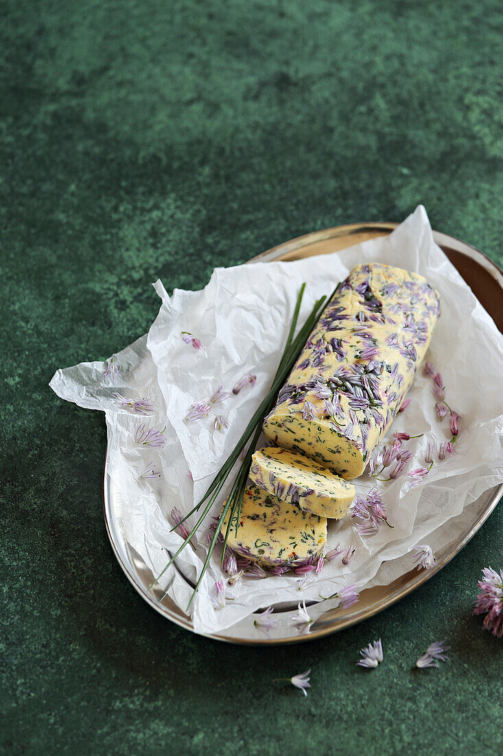 Herb butter with chive blossoms and garlic