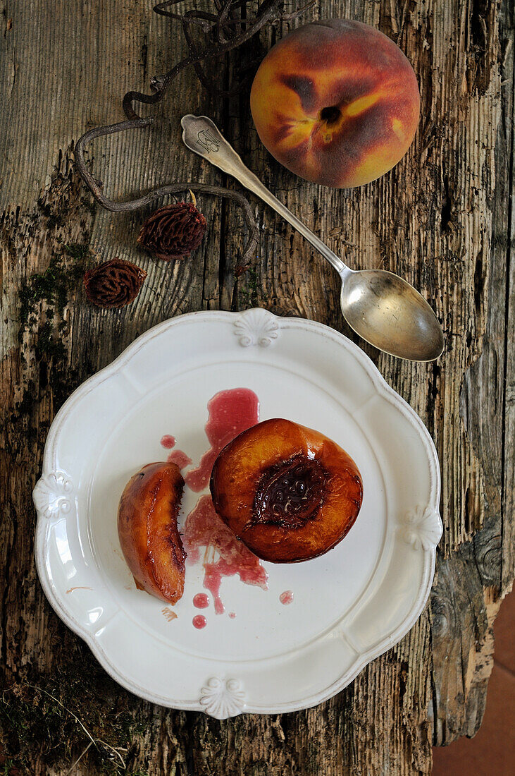 Peaches poached in red wine