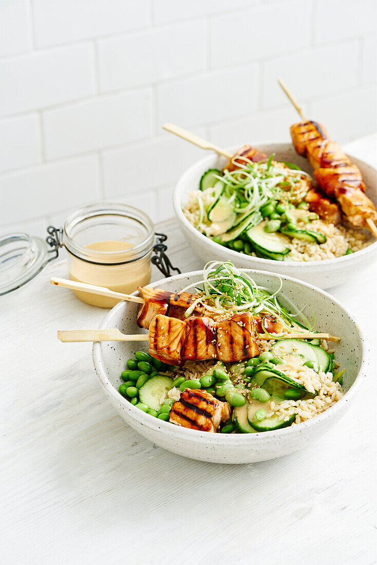 Salmon yakitori with edamame cucumber rice salad