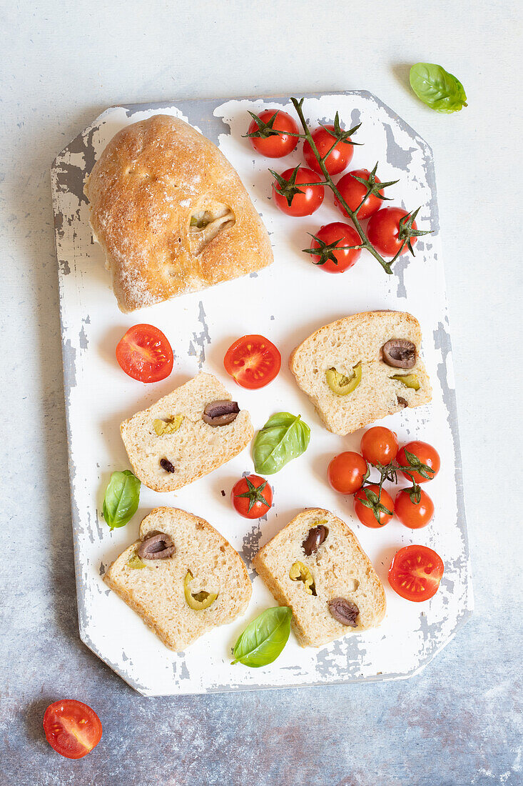 Baguette with green and black olives