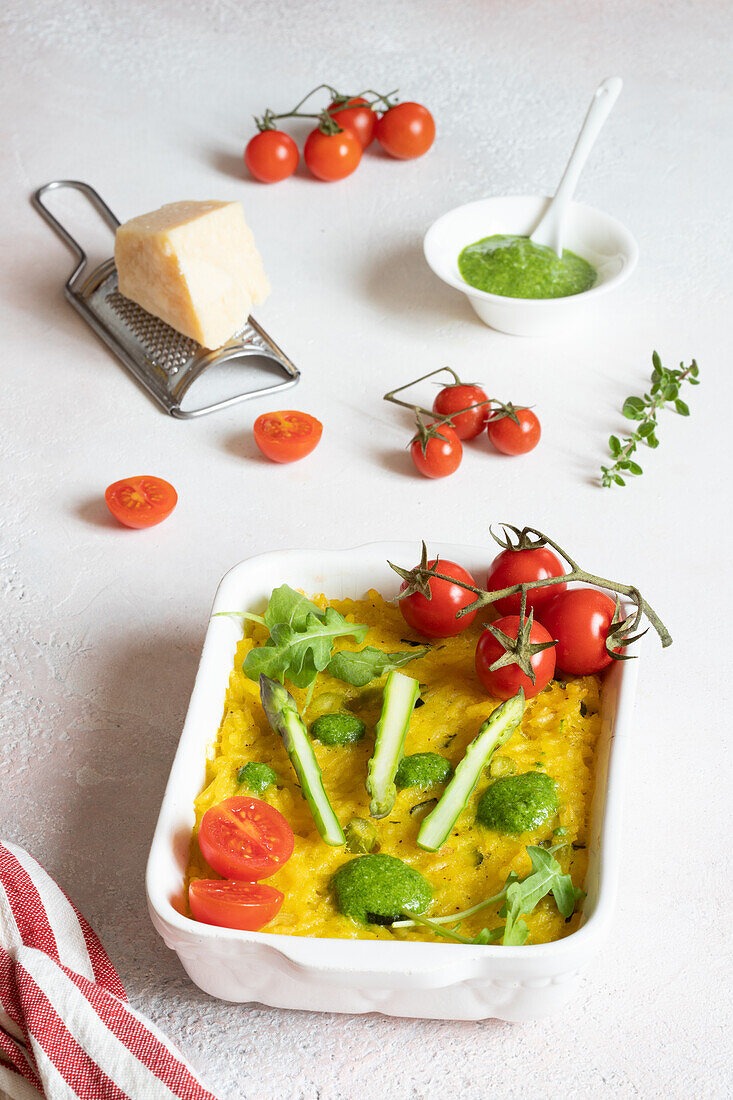 Saffron rice casserole with spring onions and asparagus