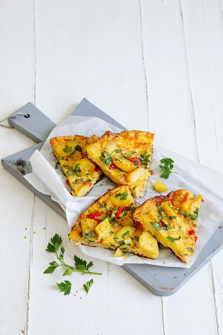 Herb tortilla with peppers and potatoes