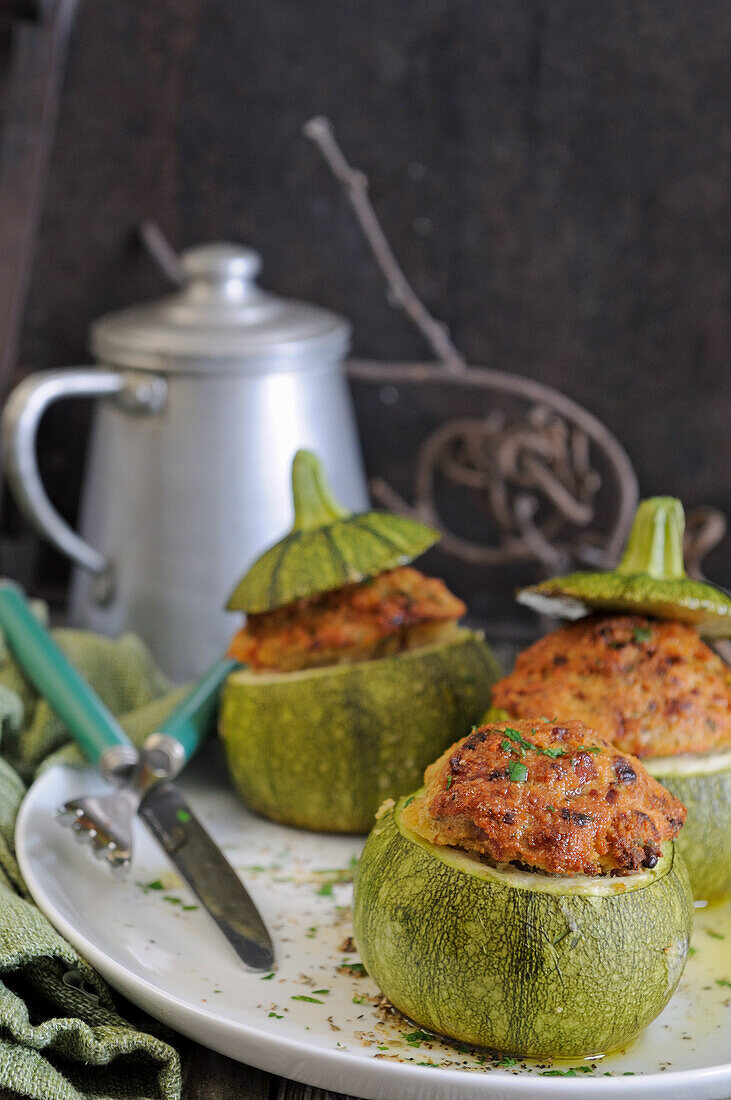 Round zucchini stuffed with parmesan baked in the oven