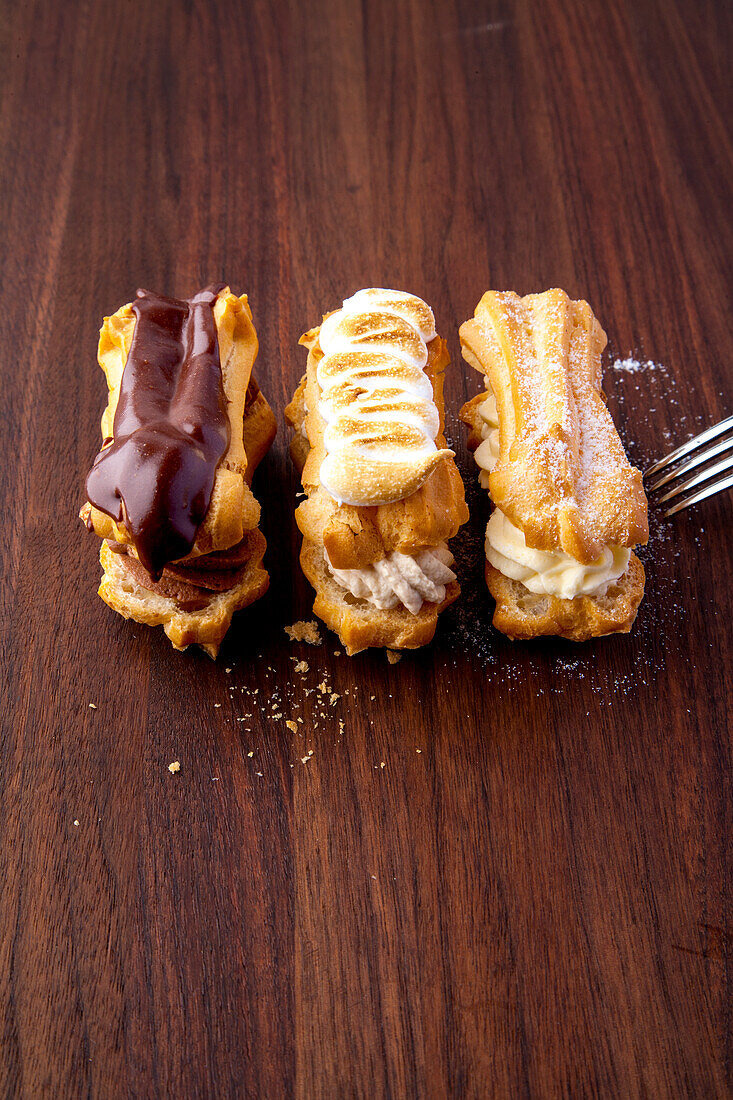 Eclaires with vanilla and chocolate filling