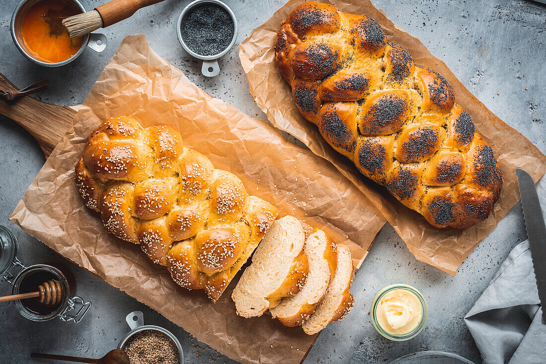 Challah (Jewish yeast plait with poppy seeds and sesame on Sabbath)