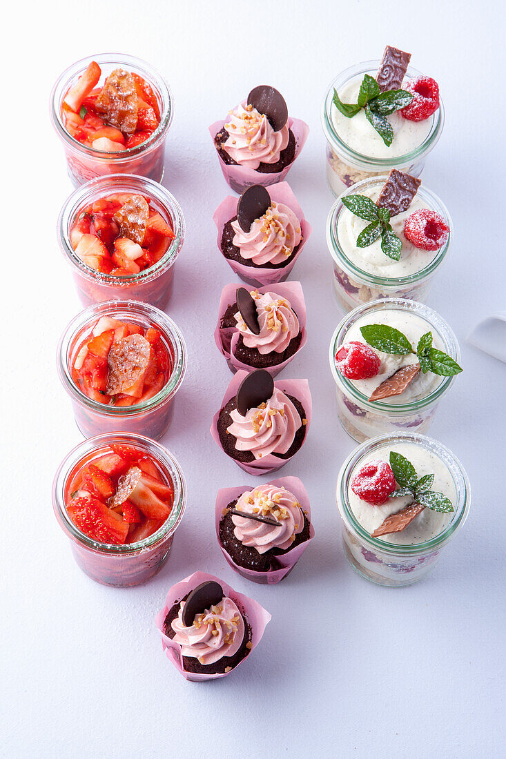 Desserts in a glass: strawberry dessert, chocolate muffins, semolina with raspberries