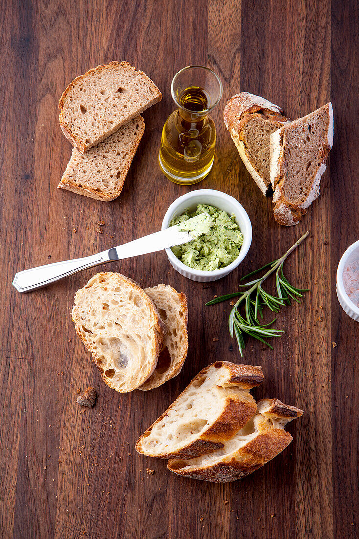 Rosemary butter with various types of bread