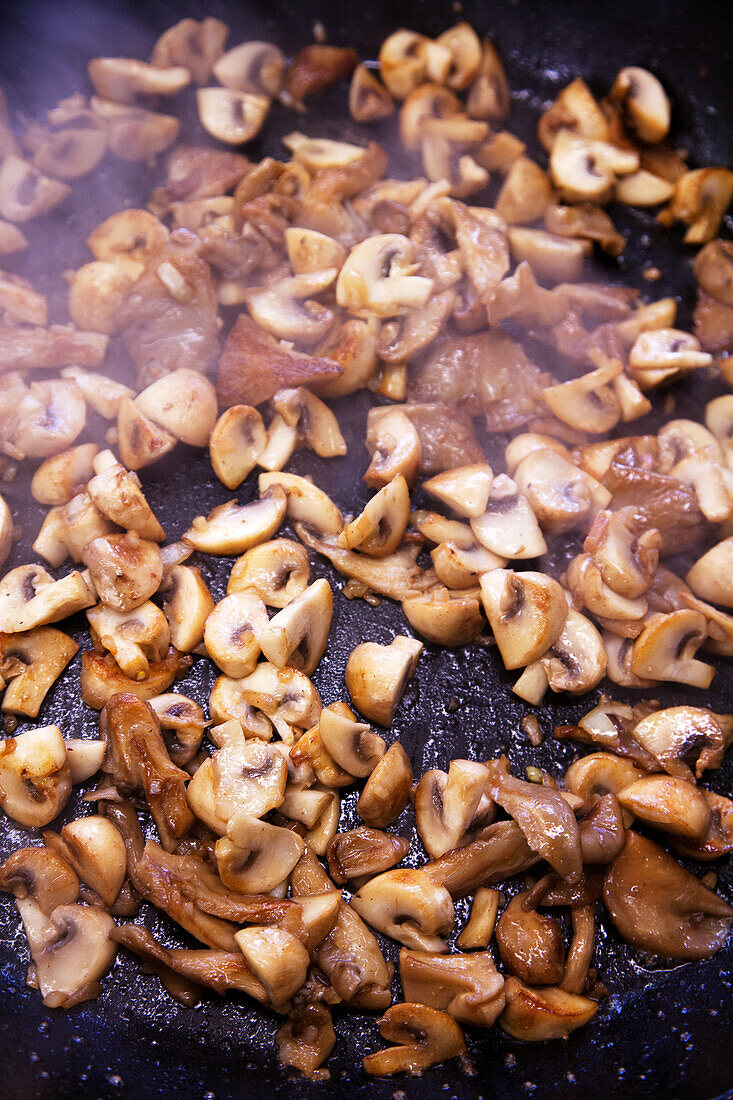 Assorted mushrooms in pan