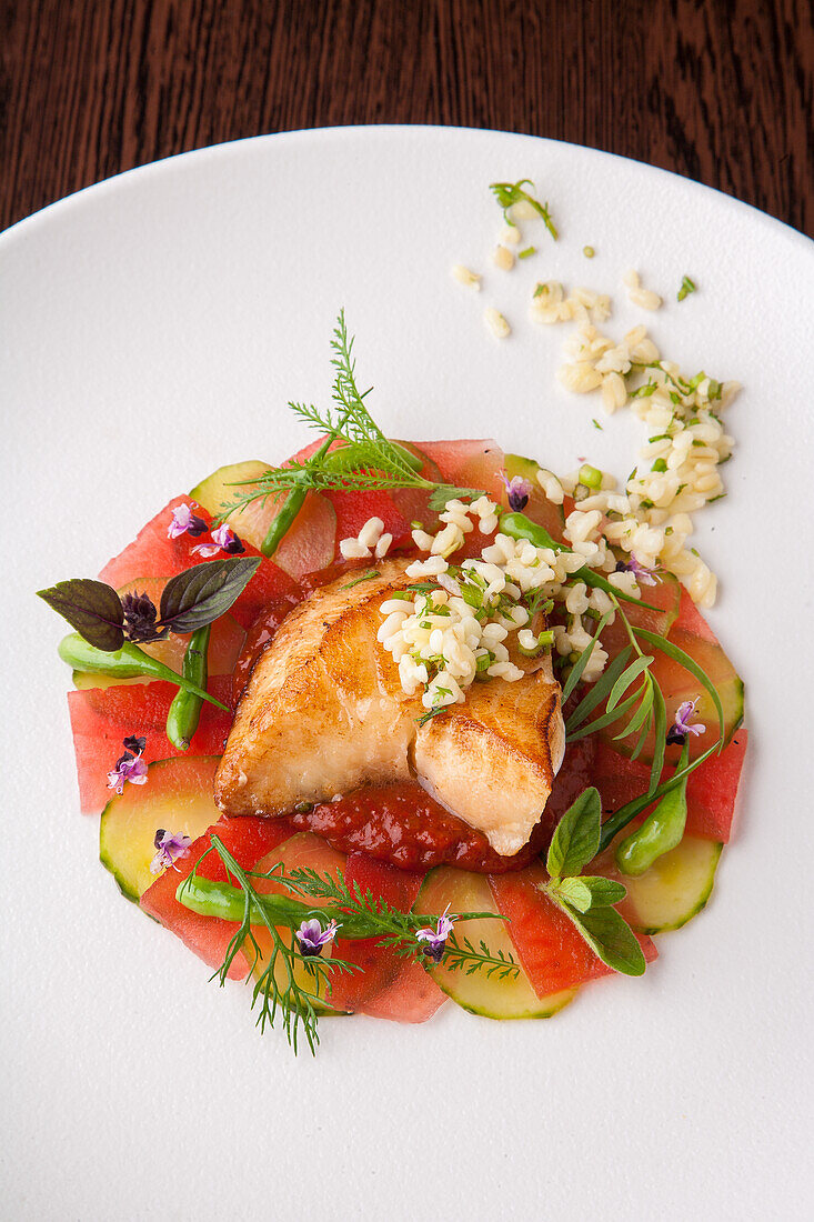 Carpaccio of cucumber and melon with sea bass, herbs and pearl barley