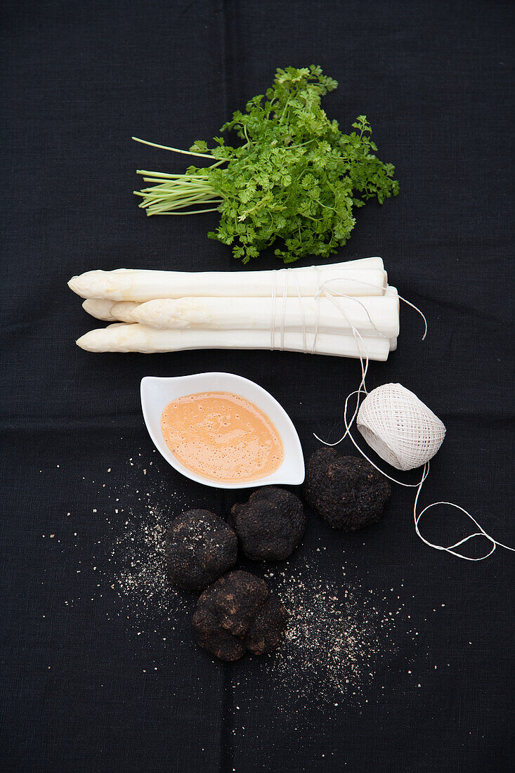 Chervil, white asparagus, sauce, and Perigord black truffle