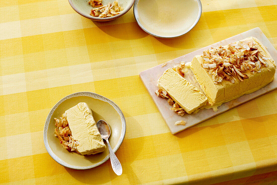 Mango ice cream cake with cardamom-scented coconut crumble