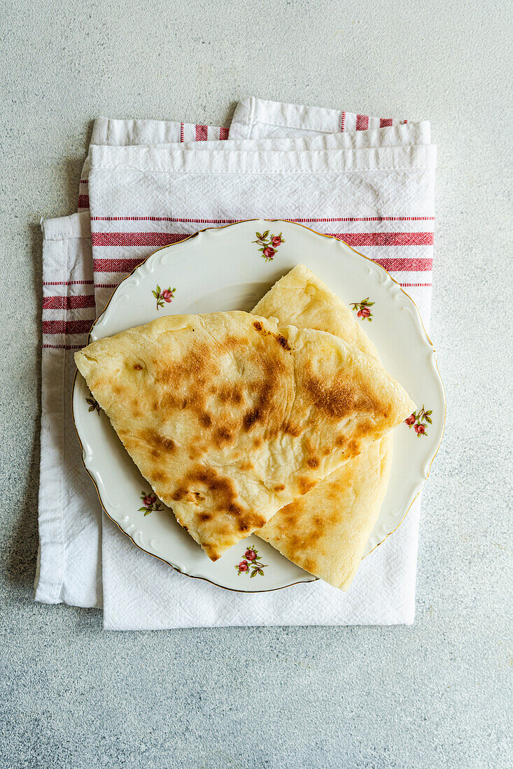 Imeruli Khachapuri (Georgian bread with cheese filling)