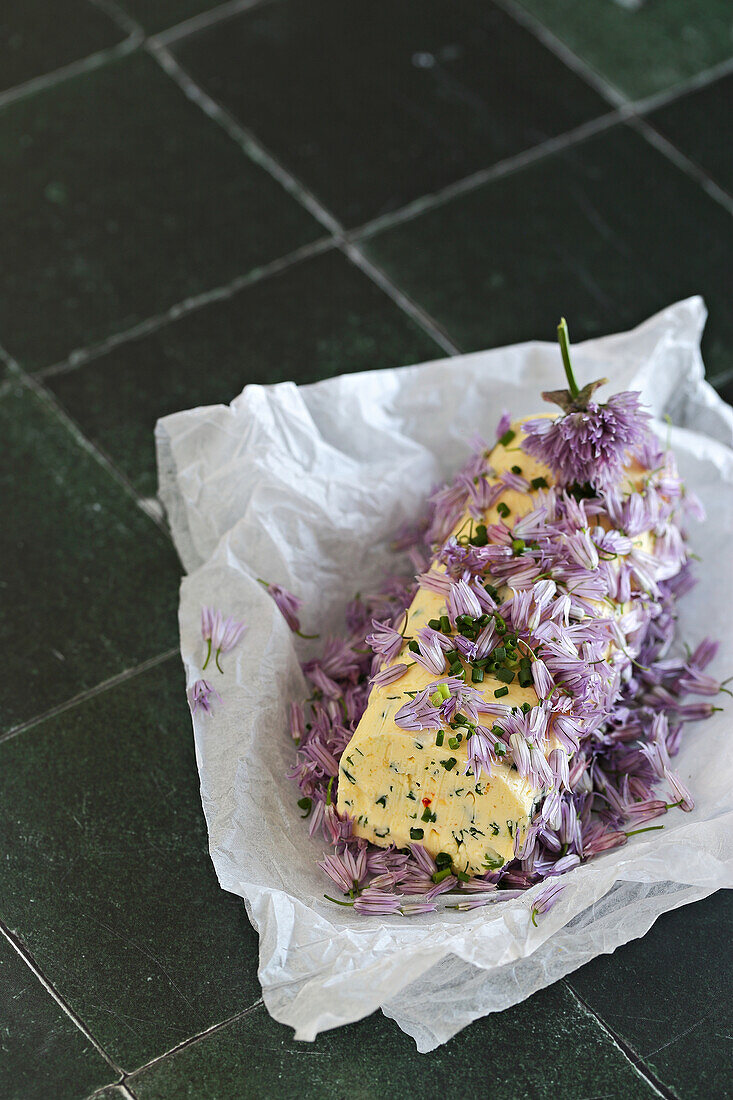 Garlic herb butter with chive blossoms