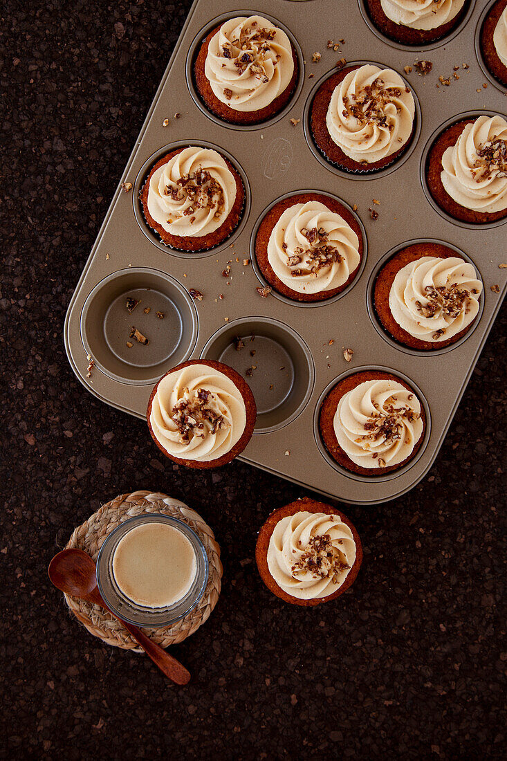 Cupcakes with caramel topping and walnut brittle