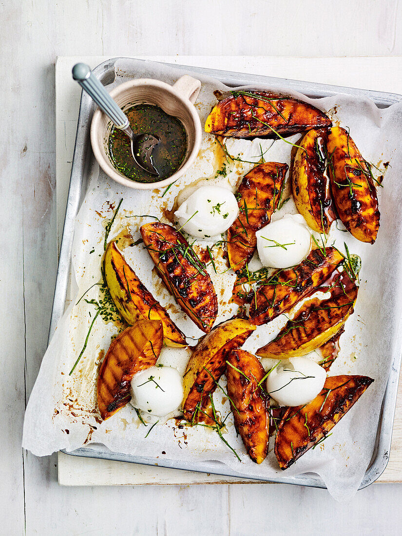 Grilled mango cheeks with lime drizzle