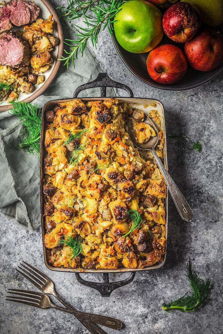 Hearty bread pudding, apples, and lamb chops