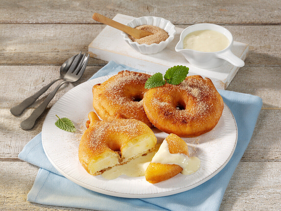 Apple fritters with vanilla sauce